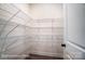 Walk-in pantry with metal shelving that will offer ample storage at 2028 Cedar Falls Dr # 10, Waxhaw, NC 28173