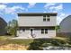 View of the backyard featuring a patio and the rear exterior of the home at 2046 E Park Dr, Lancaster, SC 29720