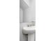 Bathroom featuring a white pedestal sink with chrome hardware and a large mirror at 2046 E Park Dr, Lancaster, SC 29720