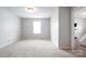 Bright and spacious bedroom with neutral carpeting, paint and ample natural light at 2046 E Park Dr, Lancaster, SC 29720