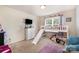 Charming ' bedroom with a lofted bed, slide, and playful decor at 2046 E Park Dr, Lancaster, SC 29720