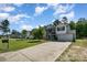 Exterior of a two-story home with a long driveway and manicured front yard at 2046 E Park Dr, Lancaster, SC 29720