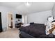 Relaxing main bedroom features a TV, shelving and an ensuite bathroom at 2046 E Park Dr, Lancaster, SC 29720