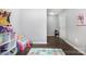 Playroom featuring an alphabet rug, keyboard, and a large wall mural at 2046 E Park Dr, Lancaster, SC 29720
