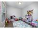 Playroom featuring a colorful alphabet rug and ample space for toys and activities at 2046 E Park Dr, Lancaster, SC 29720