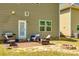 Backyard with a stone patio featuring outdoor seating, a grill, and a fire pit at 3005 Oakmere Rd, Waxhaw, NC 28173