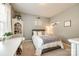 Cozy bedroom with a comfortable bed, white desk, decor, and soft lighting at 3005 Oakmere Rd, Waxhaw, NC 28173