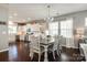 Bright dining area with hardwood floors, chandelier, and plenty of natural light at 3005 Oakmere Rd, Waxhaw, NC 28173