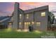 Expansive backyard featuring a patio, a grill and a fenced yard perfect for outdoor entertaining at 3124 Arklow Rd, Charlotte, NC 28269