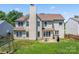 Expansive backyard featuring a patio, a grill and a fenced yard perfect for outdoor entertaining at 3124 Arklow Rd, Charlotte, NC 28269