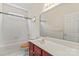 Full bathroom with vanity, toilet, and tub with shower, and a medicine cabinet at 3124 Arklow Rd, Charlotte, NC 28269