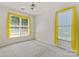 Bright bedroom with two sunny windows and a ceiling fan at 3124 Arklow Rd, Charlotte, NC 28269