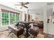 Open dining area with large windows providing natural light and an inviting seating arrangement at 3124 Arklow Rd, Charlotte, NC 28269