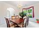 Elegant dining room with classic furnishings, a chandelier, and lots of natural light at 3124 Arklow Rd, Charlotte, NC 28269