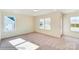 Bright bedroom featuring large windows, carpet floors, and neutral walls at 3242 Bozeman Ct # 8, Stanley, NC 28164