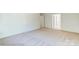 Spacious bedroom with light-filled windows and carpet floors at 3242 Bozeman Ct # 8, Stanley, NC 28164