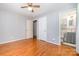 Bedroom with hardwood floors and an attached bathroom for added convenience at 3624 Delgany Dr, Charlotte, NC 28215
