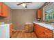 Vintage kitchen featuring vintage appliances, ample countertop space, and generous storage at 3624 Delgany Dr, Charlotte, NC 28215
