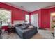 Bright bedroom with a comfortable bed and natural light from two windows at 4211 Maggie Springs Way, Clover, SC 29710