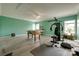 Large game room with foosball table, workout equipment, and great natural light at 4211 Maggie Springs Way, Clover, SC 29710