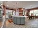 Spacious kitchen featuring a large center island, modern appliances, and an adjacent dining area at 4211 Maggie Springs Way, Clover, SC 29710