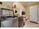 Well-equipped laundry room with modern washer and dryer at 4211 Maggie Springs Way, Clover, SC 29710