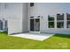 A backyard featuring a patio, a newly seeded lawn, and a fence offering a private outdoor space at 4254 Black Ct # 231, Harrisburg, NC 28075