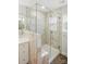 Luxurious bathroom featuring a frameless glass shower with elegant marble tiles at 4254 Black Ct # 231, Harrisburg, NC 28075