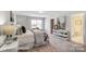 Cozy bedroom with a comfortable bed, stylish decor, and natural light at 4254 Black Ct # 231, Harrisburg, NC 28075