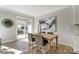 Dining area with a wooden table, comfortable chairs, and a view to the outside at 4254 Black Ct # 231, Harrisburg, NC 28075