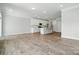 Bright kitchen with white cabinets, stainless steel appliances, and center island at 4254 Black Ct # 231, Harrisburg, NC 28075