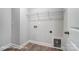 Well-lit laundry room with utility connections and easy access to the home's systems at 4254 Black Ct # 231, Harrisburg, NC 28075