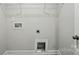 A laundry room featuring washer and dryer hookups and wire shelving at 4254 Black Ct # 231, Harrisburg, NC 28075