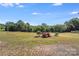 The backyard features ample space for entertaining at 4408 Robins Nest Rd, Concord, NC 28027