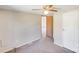 This bedroom has carpet floors, a ceiling fan, and closet space at 4408 Robins Nest Rd, Concord, NC 28027