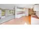 Open concept kitchen with an adjacent living room, creating a seamless flow at 4408 Robins Nest Rd, Concord, NC 28027