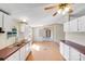 Spacious kitchen offering plenty of counter space, laminate floors, and natural light, perfect for cooking and entertaining at 4408 Robins Nest Rd, Concord, NC 28027
