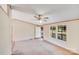 Spacious living room with large windows offering plenty of natural light and front door access at 4408 Robins Nest Rd, Concord, NC 28027