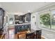 The kitchen and dining room are bright, with natural light and modern finishes at 6412 Old Meadow Rd # 69, Charlotte, NC 28227