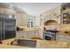 Granite countertops pair beautifully with custom cabinets and stainless steel appliances in this functional kitchen at 6914 Riesman Ln # 95, Charlotte, NC 28210