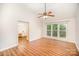 Spacious main bedroom features a vaulted ceiling, an ensuite bathroom, and backyard views at 7106 Kinsmore Ln, Charlotte, NC 28269