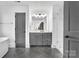 Beautiful bathroom featuring double vanity, a glass shower, modern fixtures, and herringbone floors at 8136 Energy Ln, Catawba, NC 28609