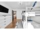 Bedroom featuring a bunk bed, dresser, decor, and an open doorway leading to an adjoining room, creating a versatile space at 8136 Energy Ln, Catawba, NC 28609