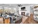 Cozy living room featuring a fireplace, hardwood floors, and a comfortable sectional sofa at 8136 Energy Ln, Catawba, NC 28609