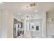 Open-concept kitchen featuring stainless steel appliances, an island, and modern lighting fixtures at 834 Van Every St, Charlotte, NC 28205