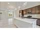 Bright, modern kitchen featuring stainless steel appliances, island, and open-concept design at 834 Van Every St, Charlotte, NC 28205