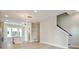 Spacious living area featuring an open floor plan, natural light, and hardwood flooring at 834 Van Every St, Charlotte, NC 28205