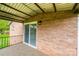 Relaxing back porch with sliding glass door and iron railings at 975 22Nd Street Ne Pl, Hickory, NC 28601