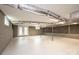 A finished basement featuring concrete walls, drop ceilings and bright, painted concrete floor at 975 22Nd Street Ne Pl, Hickory, NC 28601