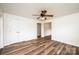 Bright and airy bedroom with wood-look flooring and ceiling fan at 975 22Nd Street Ne Pl, Hickory, NC 28601